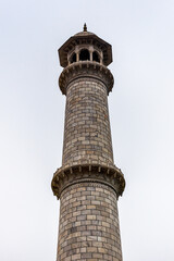 It's Minaret at the Taj Mahal (Crown of Palaces), an ivory-white marble mausoleum on the south bank of the Yamuna river in Agra.