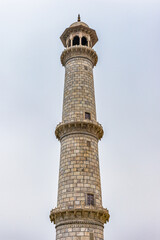 It's Minaret at the Taj Mahal (Crown of Palaces), an ivory-white marble mausoleum on the south bank of the Yamuna river in Agra.