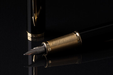 fountain pen on black