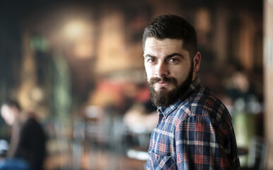 Obraz premium portrait of a young man with a mustache and beard