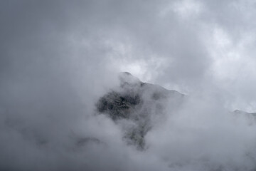 Fog revealing the Saccarello mount, Ligurian Alps, northwestern Italy