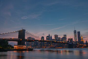 Fototapeta na wymiar Brooklyn Bridge and Manhattan Skyline at sunset 