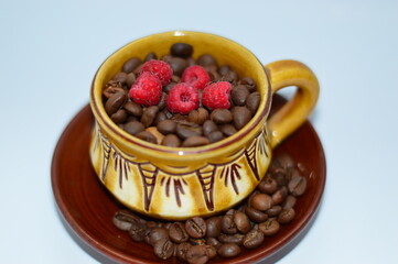 cup of coffee with red berries raspberry 