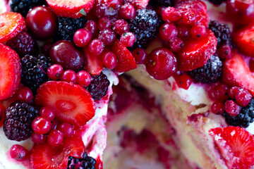 Sweet summer concept. Different berries and cut out cake price.