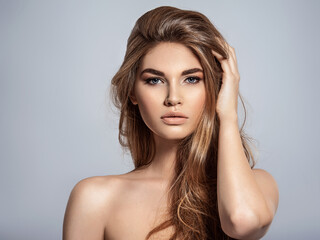 Woman with beauty long brown hair and natural makeup