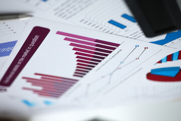 Financial statistics documents on clipboard pad at office table closeup. Internal Revenue Service inspector sum check, irs investigation, exchange market, earnings, savings, loan and credit concept