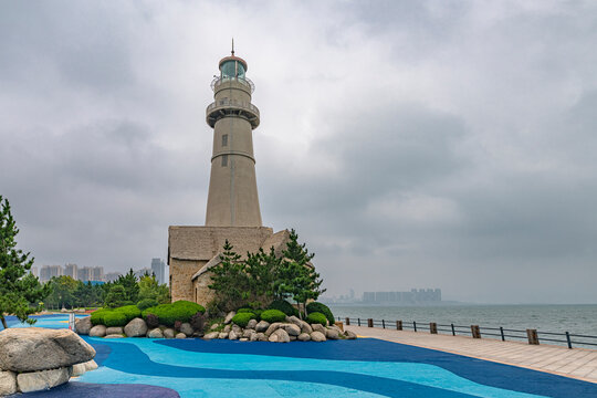 Lighthouse by day. Marine embankment of Weihai, China