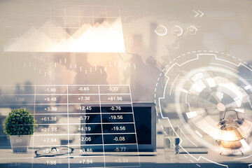 Forex graph hologram on table with computer background. Multi exposure. Concept of financial markets.