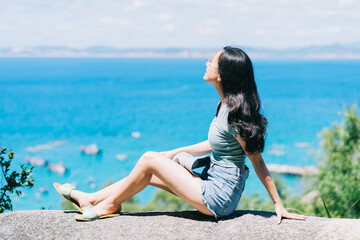 Vietnamese woman posing to photograph in Cu Lao Xanh island, Quy Nhon city, Binh Dinh province