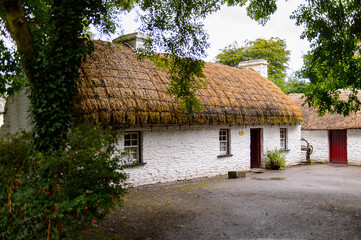 Fototapeta na wymiar House in Bunratty village (End of the Raite river) is an authentic small village in County Clare, Ireland