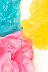 3 multicolour disposable plastic bags on white background. 