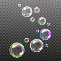 Transparent rainbow soap bubbles on checkered background.