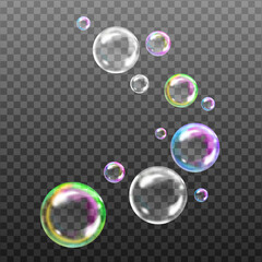 Transparent rainbow soap bubbles on checkered background.