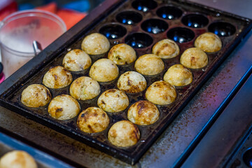 Takoyaki is a snack of Japan. Can be easily purchased at street food