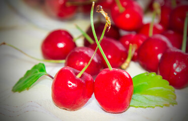 delicious red cherries in background