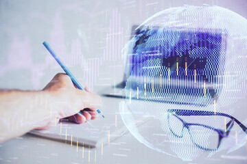 Multi exposure of man hands with stock market forex graph.