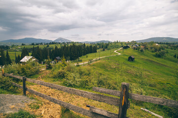 Hiking to mountain village at summer season, travel concept, Ukraine