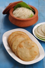 ideyappam and pathiri with blue background