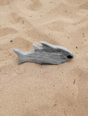 Tropical beach with fish wooden in sand, Concept of summer relaxation