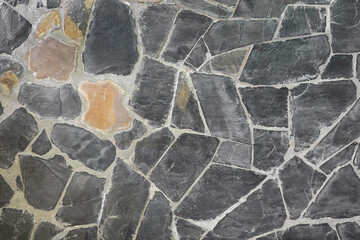 Black slate stone wall texture background