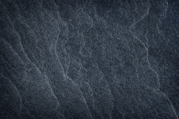 Dark grey stone / black slate stone background or texture