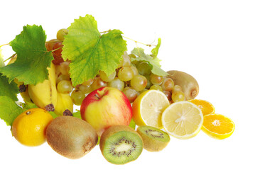 Sliced fruits and grapes on a white background.