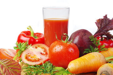 Vegetable juice and vegetables on white. Tomatoes, cucumber, onions, peppers, carrots, beets, parsley on a white background.