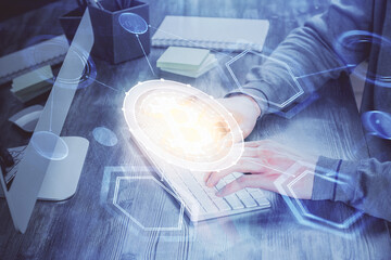 Blockchain theme hud with businessman working on computer on background. Concept of crypto chain. Multi exposure.