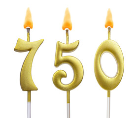 Golden birthday candles isolated on white background, number 750