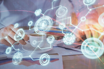 Media network theme hologram with man working on computer on background. Concept of internet communication. Double exposure.