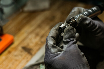 close-up. The jeweler makes a silver ring. On the island of Bali. Indonesia