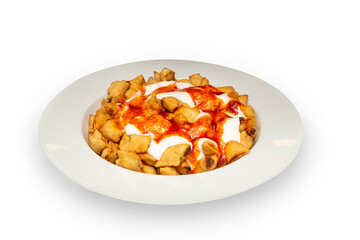 Ravioli - Turkish Manti on plate with red pepper. Isolated