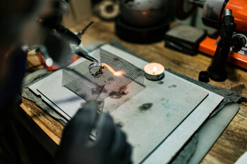 close-up. The jeweler makes a silver ring. On the island of Bali. Indonesia