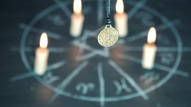 amulet of predictions on the background of the magic circle. helps in exchanging information with parallel worlds and foreseeing the future, serves to develop intuition. 