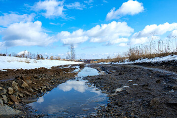 dirt road in the countryside in winter time