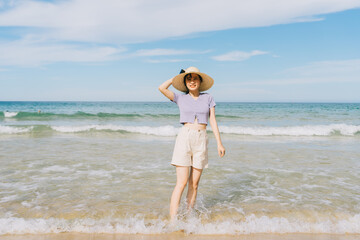Fototapeta na wymiar A picture of Asian woman travel to Ky Co beach, Quy Nhon City, Binh Dinh province, Vietnam
