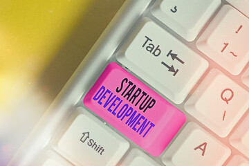 Writing note showing Startup Development. Business concept for developing idea which signifying...
