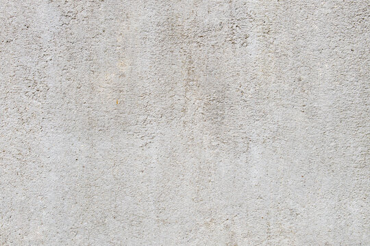 Concrete / stone / rock gray grunge grainy wall background / texture / pattern / wallpaper