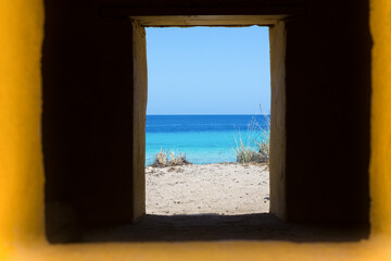 View through two windows with sea view