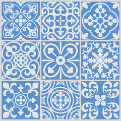 Patchwork texture from tiles in the oriental style in blue and gray. Abstract background. Geometric ceramic design tile