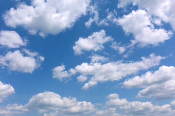 Fototapeta premium Blue sky background with white clouds.