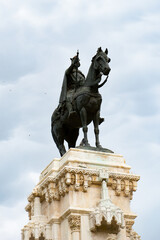 Fototapeta na wymiar It's Bronze equestrian statue of Ferdinand III of Castile in the Plaza Nueva, Sevilla