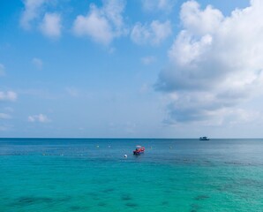 Landscape beautiful white sand beaches turquoise waters and bright blue sky on sunny day.  beautiful nature for summer holidays thailand