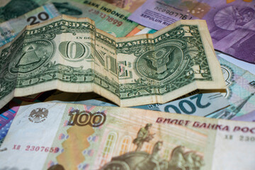 Closeup shot of different currencies. Good for presentations in finance, accounting or business development 