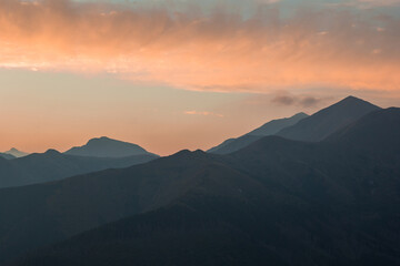Colorful clouds at sunset above mountains in Poland