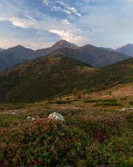 Fototapeta premium Amazing sunrise in calm mountain village, autumn