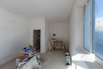Fototapeta na wymiar making repair in flat, wall repair, plastering and painting