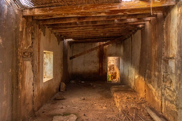 Fototapeta na wymiar old abandoned and ruined construction