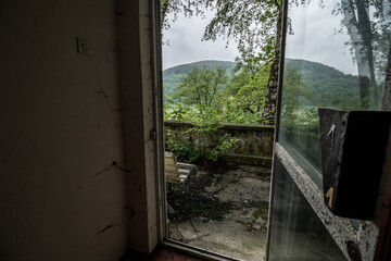 The interior of the buildings in an abandoned resort located in the middle of the forest