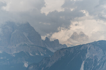 Dolomites landscape in clouds.